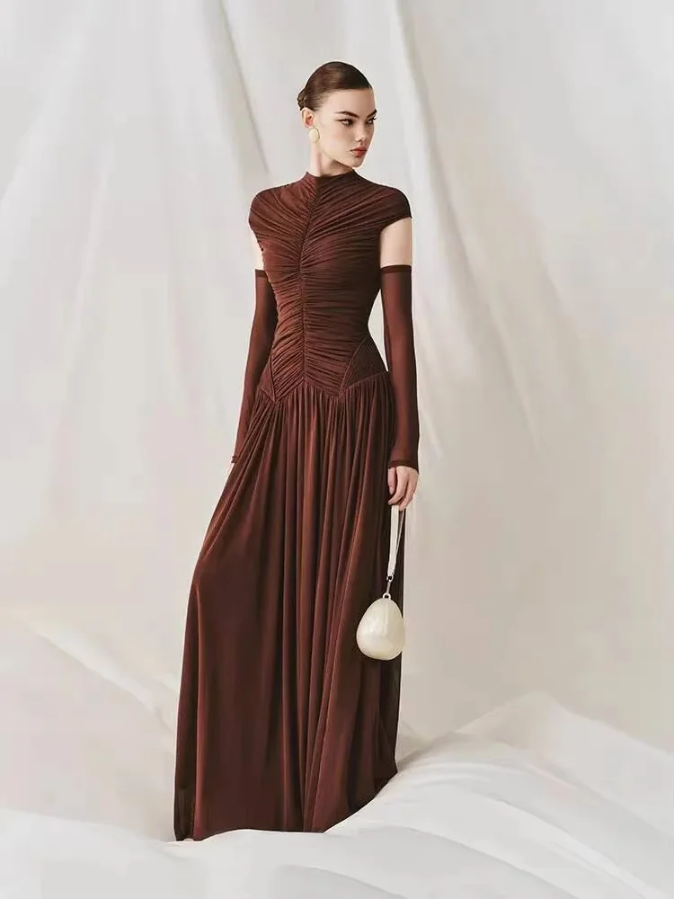 Stand collar cap sleeve pleated long gown matched with long gloves. Fitted waist with flowing pleated skirt. Custom sizes availa