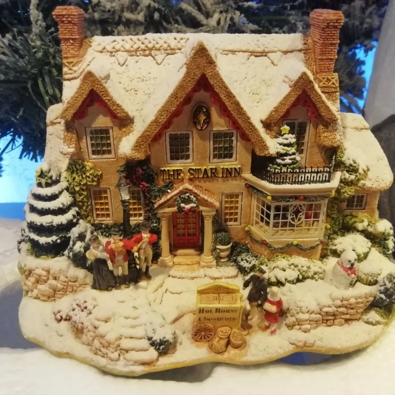 

Four combinations of Christmas snow house ornaments