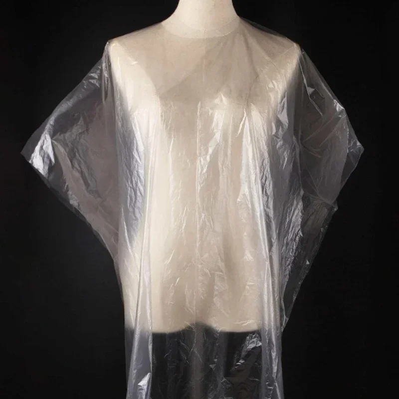 Capas de cabeleireiro descartáveis, PE impermeável avental, Cutting Dye Hair Cape, Acessórios barbeiro, pano transparente, 200pcs