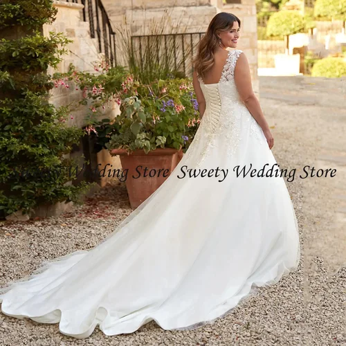 Imagen 2 del producto Vestido de novia personalizado de talla grande para novia, manga casquillo, cuello en V, apliques, corte en A, corsé de cola, vestido de novia