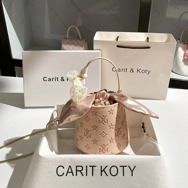 

French-style embossed bucket bag with a high-end feel, chain crossbody handbag