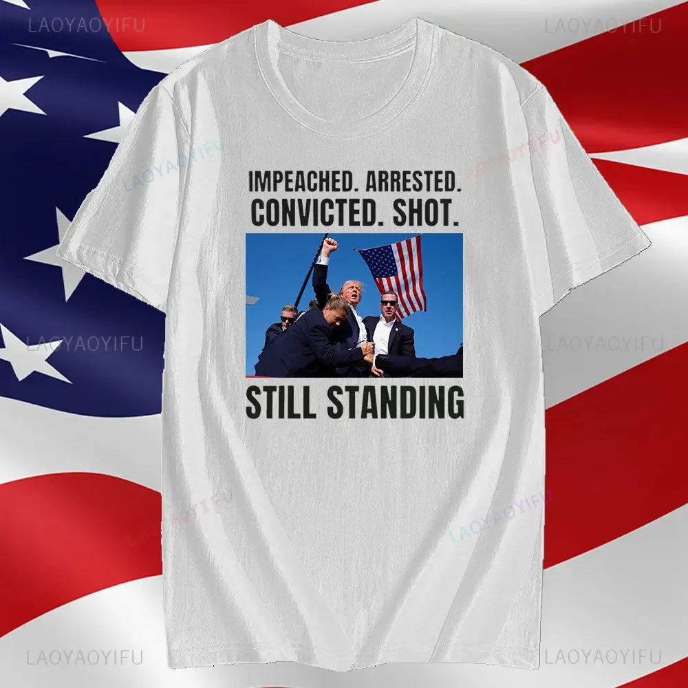 Camiseta Trump Shot Assassination Attempt Still Standing Me Stronger Tshir Camiseta estampada de algodón para hombres y mujeres camisetas gráficas