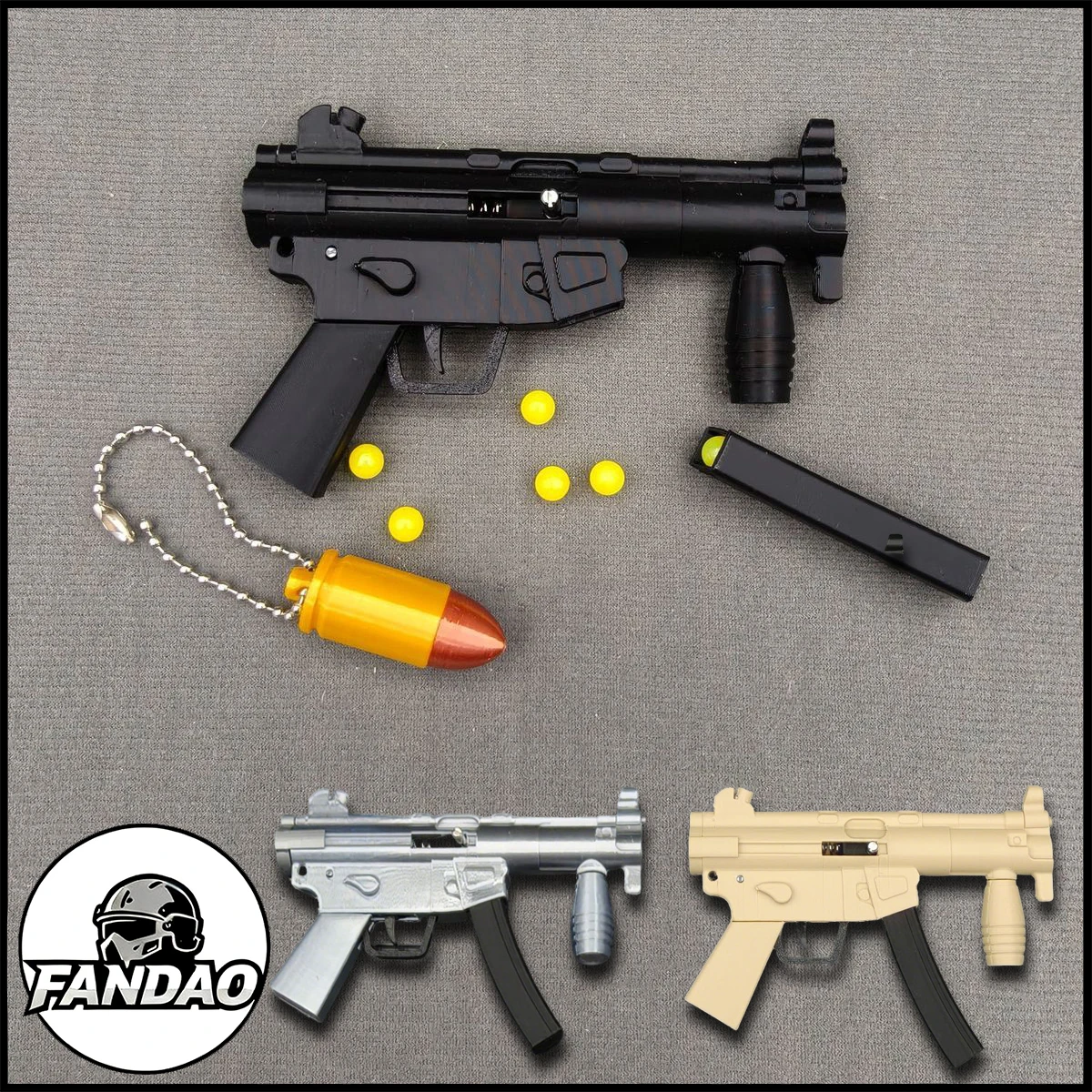 

Mp5 Mini Keychain Fireable Tiny Keychain Guns Shape Pendant with 50 Plastic Bullets Cool Keychains for Children's Men Soldier