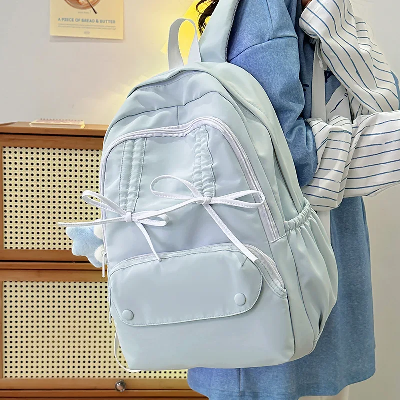 

Pure and fresh sweet bowknot simple student schoolbag large capacity multi-pocket female travel backpack