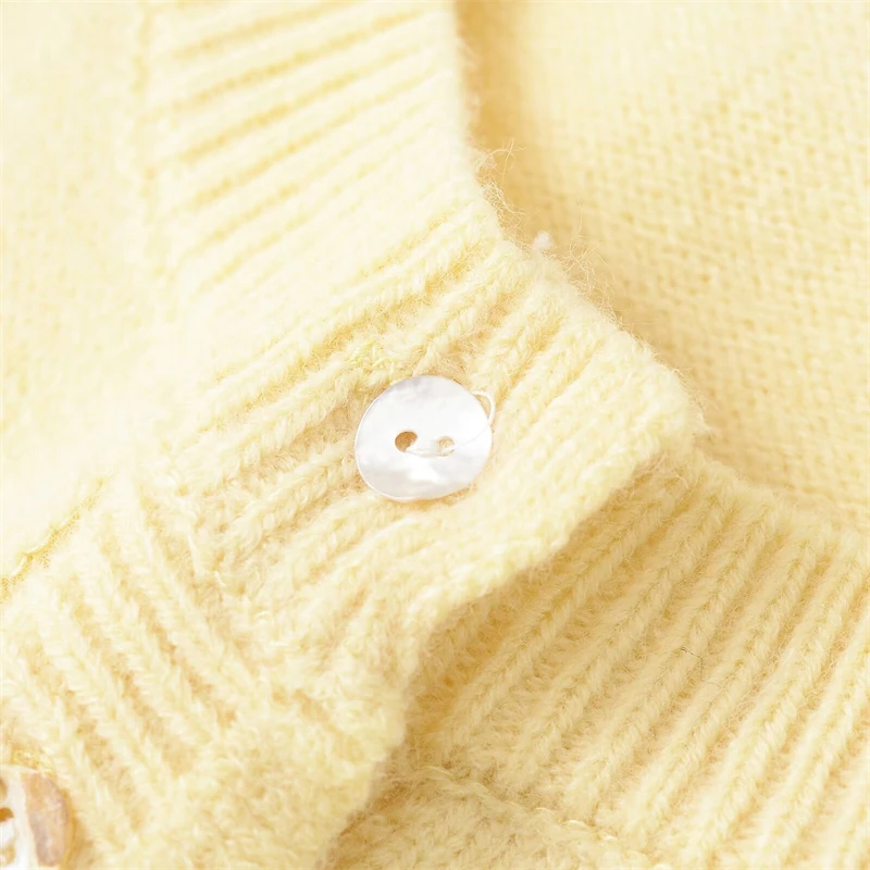 KEYANKETIAN Wiosna/Jesień Nowe damskie Agaric Dekoracja Dzianinowe swetry rozpinane Podstawy Jednolity kolor O-Neck Z długim rękawem Wąski sweter Top