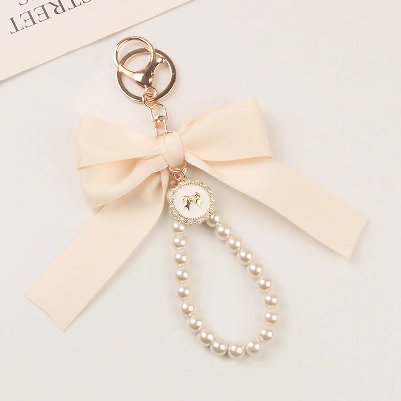 Beautiful Muti-colors Bowknot Keychain Pearl Bag Chains Fashion Bag Phone Pendant High Quality Headphone Bag Case Accessories