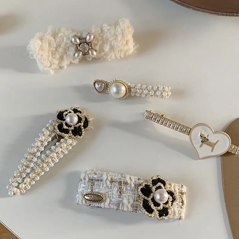 Pasadores de Camelia blancos para mujer, conjunto de horquillas, venta al por mayor, novedad de 2024, elegantes pinzas para el cabello de Camelia tejidas de lana y Cachemira