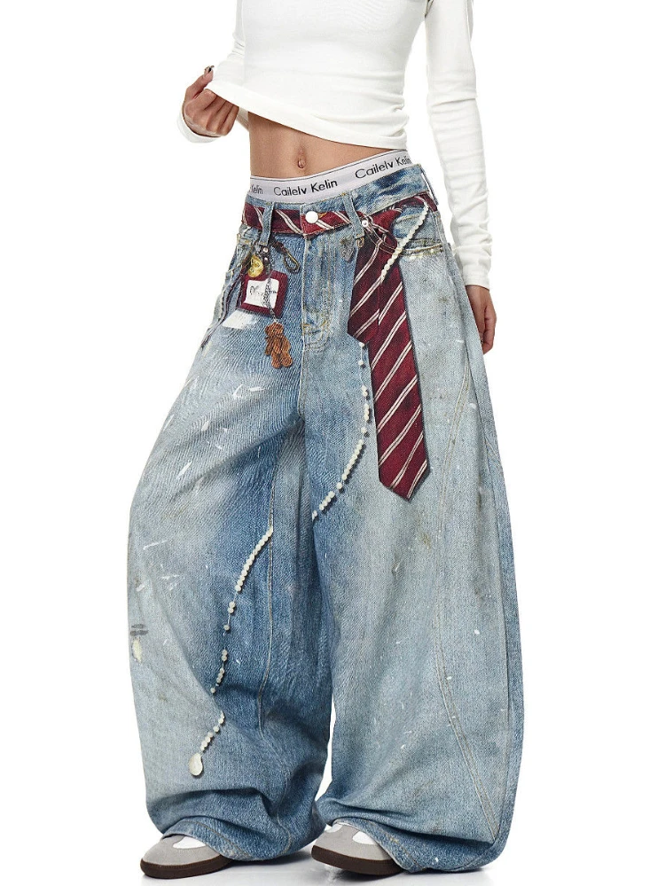 American retro three dimensional tie printed curved knife jeans women's autumn new design loose and wide leg pants