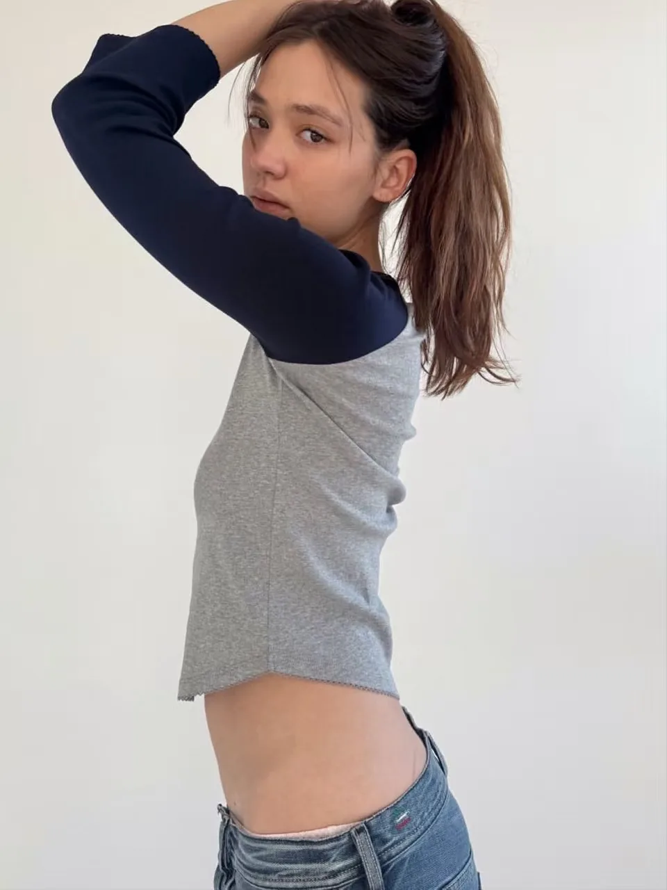 COU Purple and White Off-the-Shoulder Three-Quarter Sleeve Flared Sleeve Top with Navy and Grey Color-Blocked Irregular Hem.