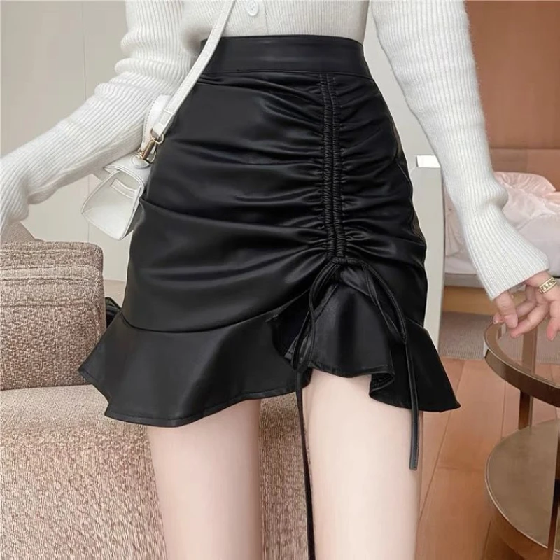 Korean Fashion Autumn Winter Women Solid Zipper Ruffles Drawstring Chic High Waist Short Slim A-line PU Leather Bag Hip Skirt