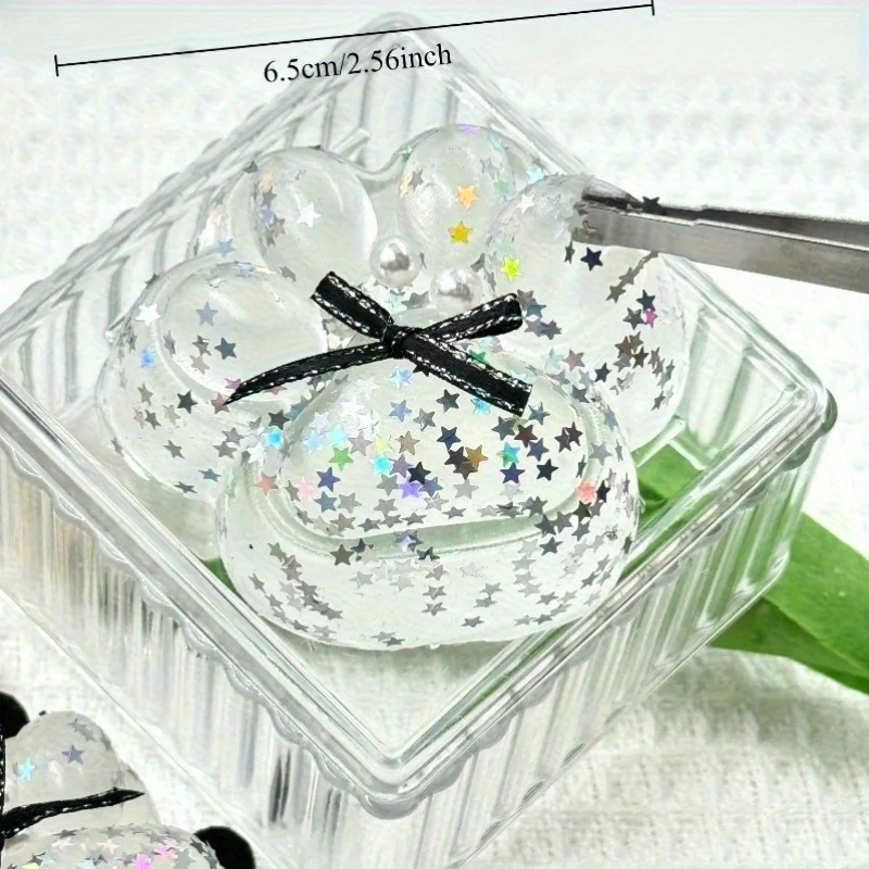 透明な弓型猫の足絞りおもちゃ