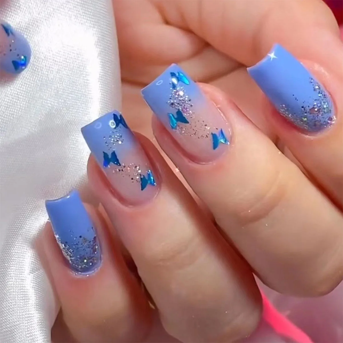 

24 pieces of gentle nude long press-on nails (square shape), paired with 1 piece of jelly glue and 1 nail file
