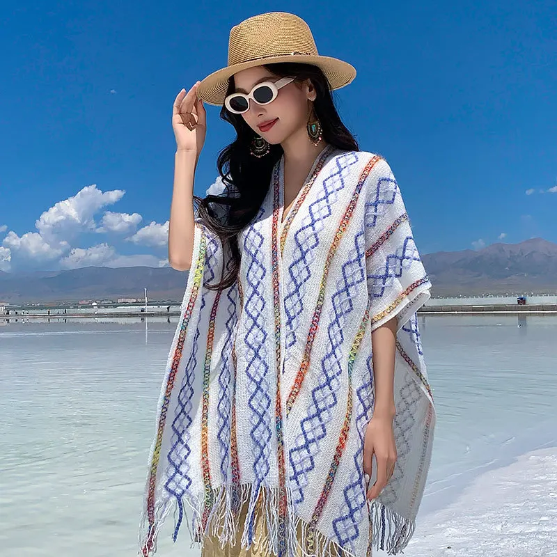 

Travel outerwear women: colorful striped ethnic style knitted fringed cape shawl cardigan with tassels