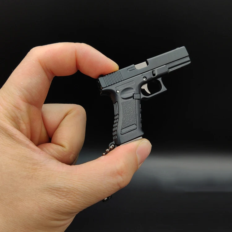 1PC Alloy Empire 1:3 Glock brelok Jedi Survival pistolet ozdoby modelowe symulacja odpinany żołnierz sprzęt z kulami