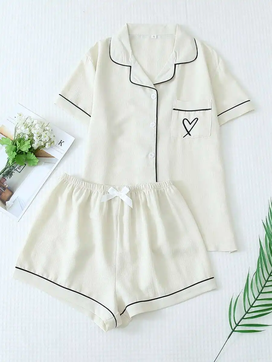 

2pcs Women's Solid Color Summer Trim Contrast Collar Pocket Heart Graphic Short Sleeve Button Top And Bow Shorts Pajama Set, Suitable For Home Wear