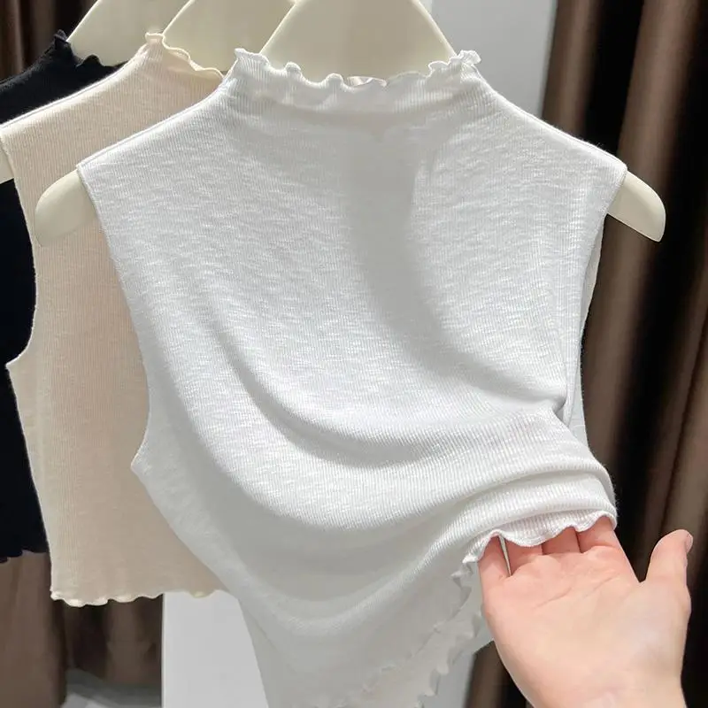 colete-feminino-de-trico-de-alta-qualidade-com-gola-falsa-meio-alta-e-borda-com-efeito-de-madeira-peca-interna-elegante-e-ve