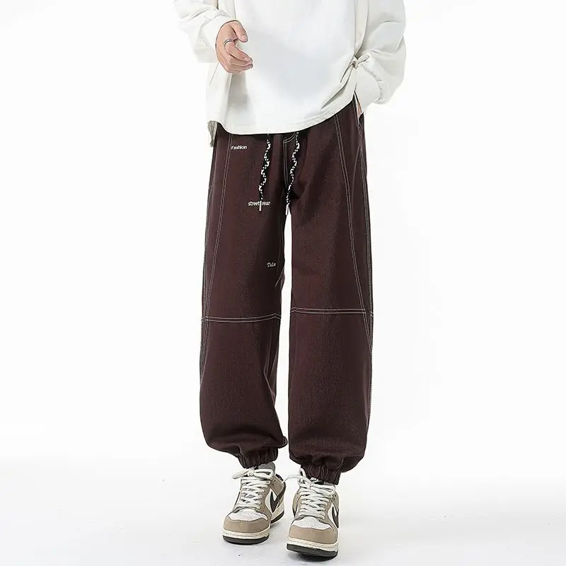 Pantaloni da uomo stile retrò taglie forti versatili per la primavera e l'autunno pantaloni allacciati alla caviglia pantaloni da lavoro casual larghi e dimagranti