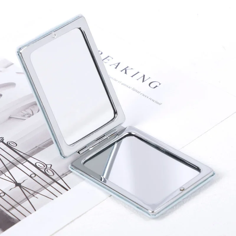 Espejo de maquillaje de cuero PU Rectangular versión coreana, espejo de maquillaje de Metal con impresión en Color de doble cara, espejo pequeño de regalo para mujer