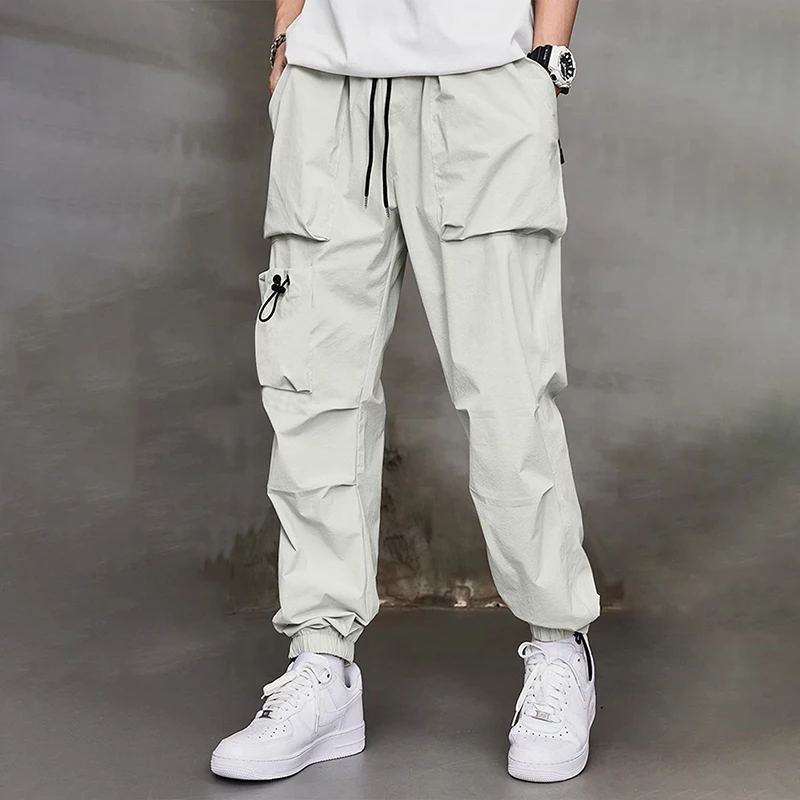 

Men's work pants fashion brand Spring and Autumn new multi pocket American sports pants wrapped leg pants men's casual pants