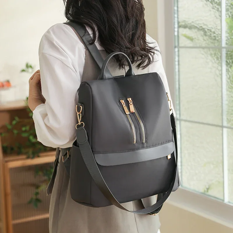 Sac à dos de voyage en nylon pour femme, sac à dos pour adolescente, sacs initiés décontractés, sac à dos pour femme, sac à main noir, design à la mode, 2023