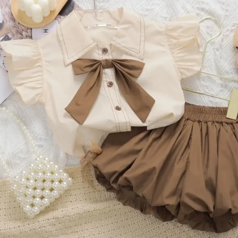 Set estivo per neonate 2024 New Bow Tops + shorts Set di due pezzi per bambini abbigliamento per bambini