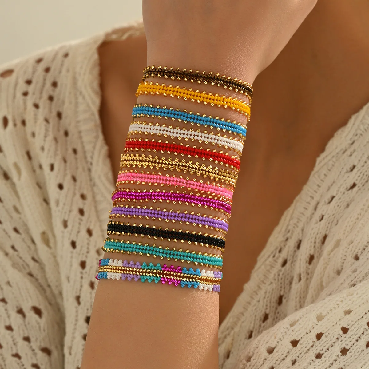 ZGMXR Rainbow Gradient Color Rice Bead Bracelet for Women Hand Woven Bohemia Fashion Adjustable Hollowed-out Design