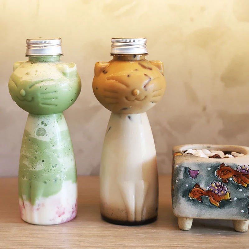 Homemade Juice Bottles Transparent Juicing Beverage PET Bottle Cold Drink Milk Tea Juice Sealed Cap Cold Drink Cat Bottle