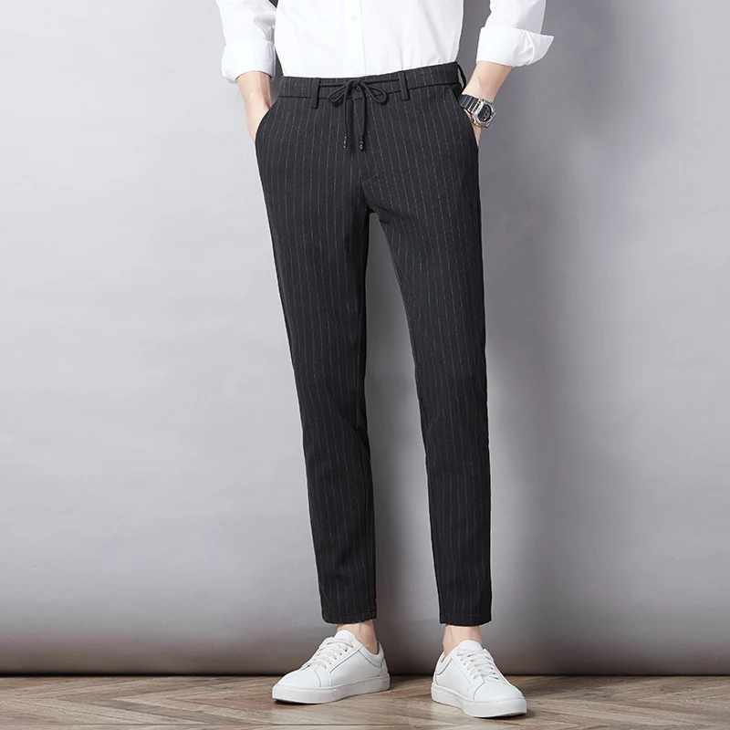 

Модные мужские повседневные брюки с завязками, регулируемым поясом, удобными манжетами на ногах и стильным дизайном задних карманов.