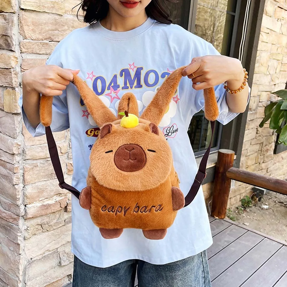 Leuke verdikte capibara pluche rugzak geborduurd lichtgewicht cartoon dier dagrugzak bruin zacht grote capaciteit schooltas meisjes