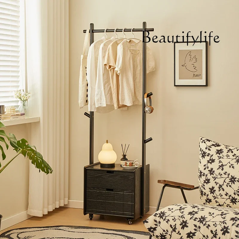

Solid wood bedside coat rack integrated household bedroom black movable floor-to-ceiling vertical hanger