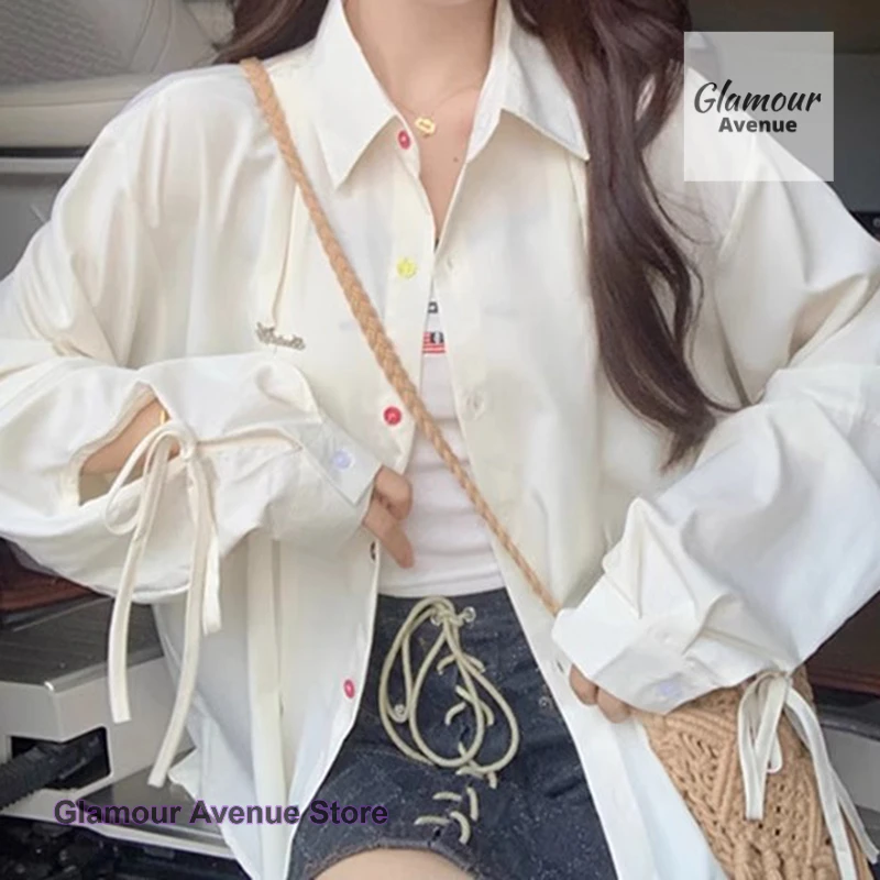 

French loose color button plus size design sense lace-up Polo neck long sleeve shirt female autumn slim loose cardigan top.