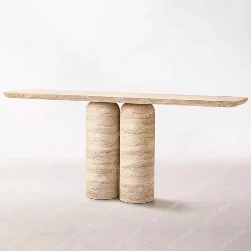 A Minimalist entrance table Natural travertine entrance table against the wall