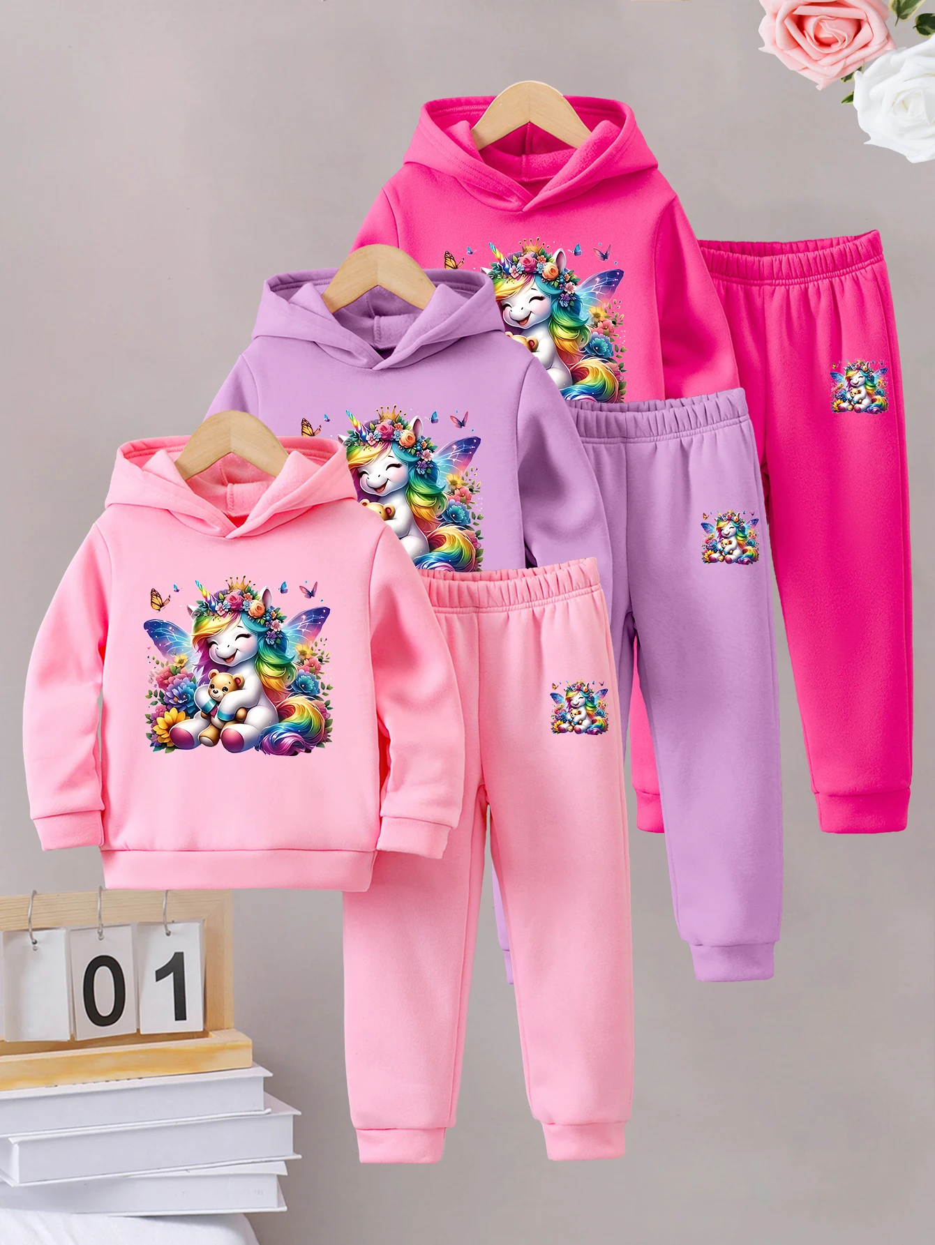 

A six-piece set of warm, fleece hooded sweatshirt and sports pants for girls in autumn and winter, with cartoon prints