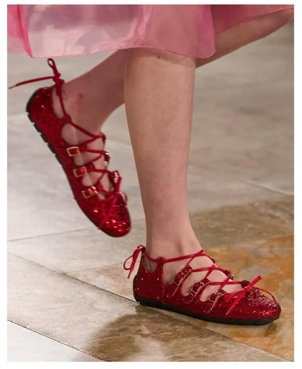 

Red Glitter Round-Toe Strappy Flats Multi-Buckle Detail Lace-Up Ankle Tie Playful Bow Accent Sparkling Textured Casual Looks