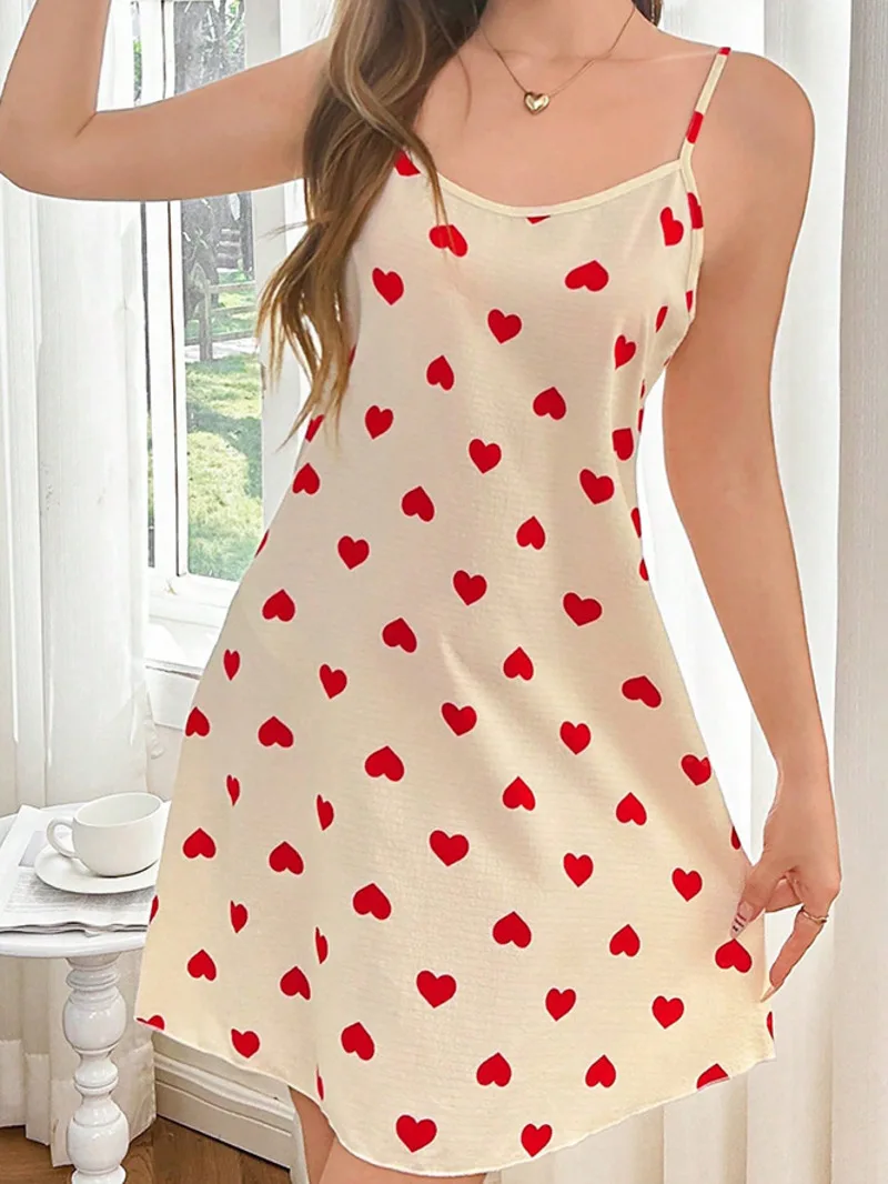 Venta caliente de verano camisón de seda de leche vestido de tirantes Sexy ropa de casa para mujeres Casaul vestido elegante vestido con estampado de corazón encantador 80LB