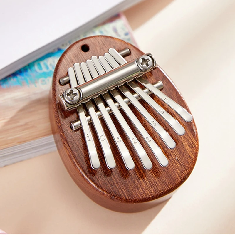 

Cute Thumb Piano Musical Good Portable Instrument Gift For Beginners Music Lovers