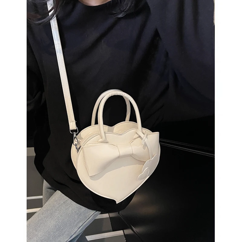 

2025 Spring Red Bowknot Heart aped Handbag Women's Crossbody Bag Unique Design Japanese Lolita Sle Soft PU Leather Bag