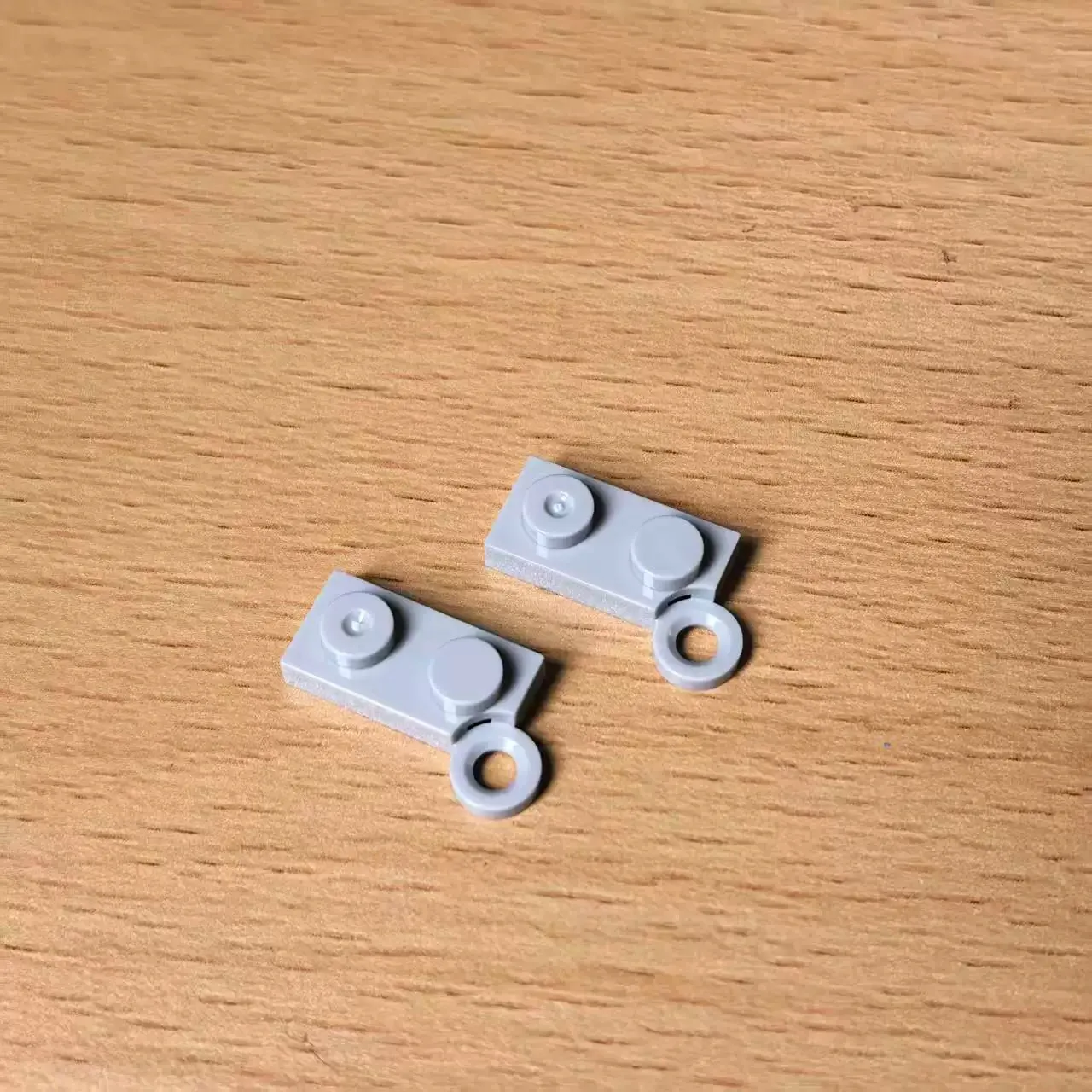 Building block 2429-2430-73983-19953-19952-19952-6102769-6416524-1927 hinge board 1 x 4 rotating top, bottom hollow clamp
