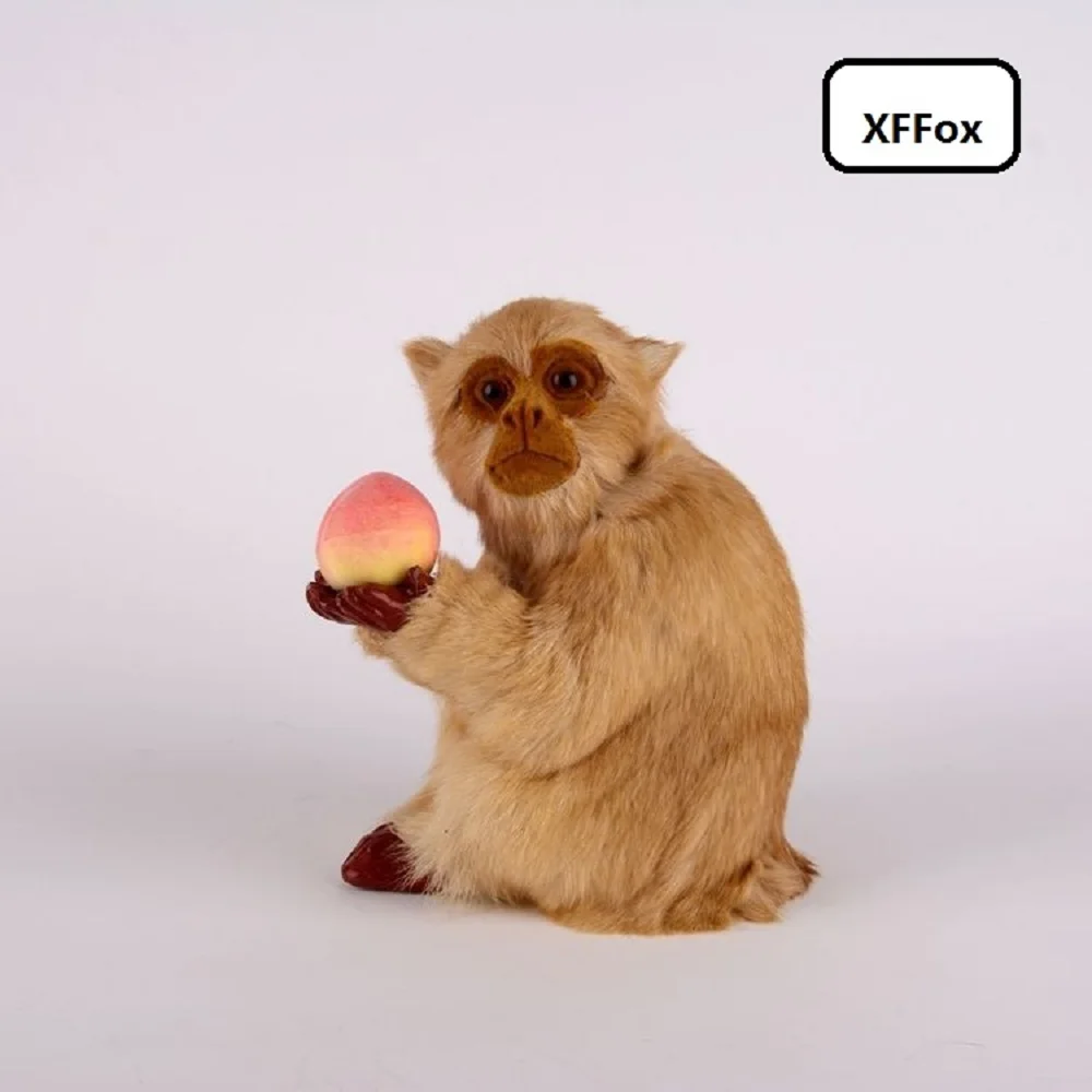 new real life monkey model plastic&furs simulation sitting monkey hold a peach gift about 16x12x20cm xf2034