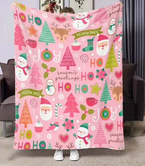 A Pink Christmas-themed Throw Blanket with Santa Claus, Cute Reindeer, Holly Leaves, and Snowman Prints. A Shawl Blanket