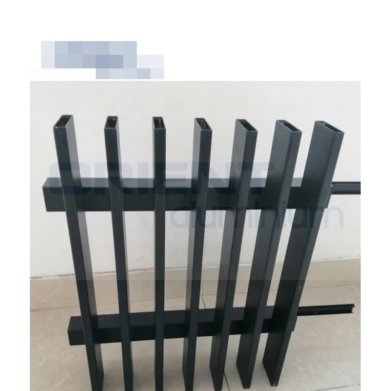 Brown/dark gray aluminum fence panel for gardens with aluminum columns.