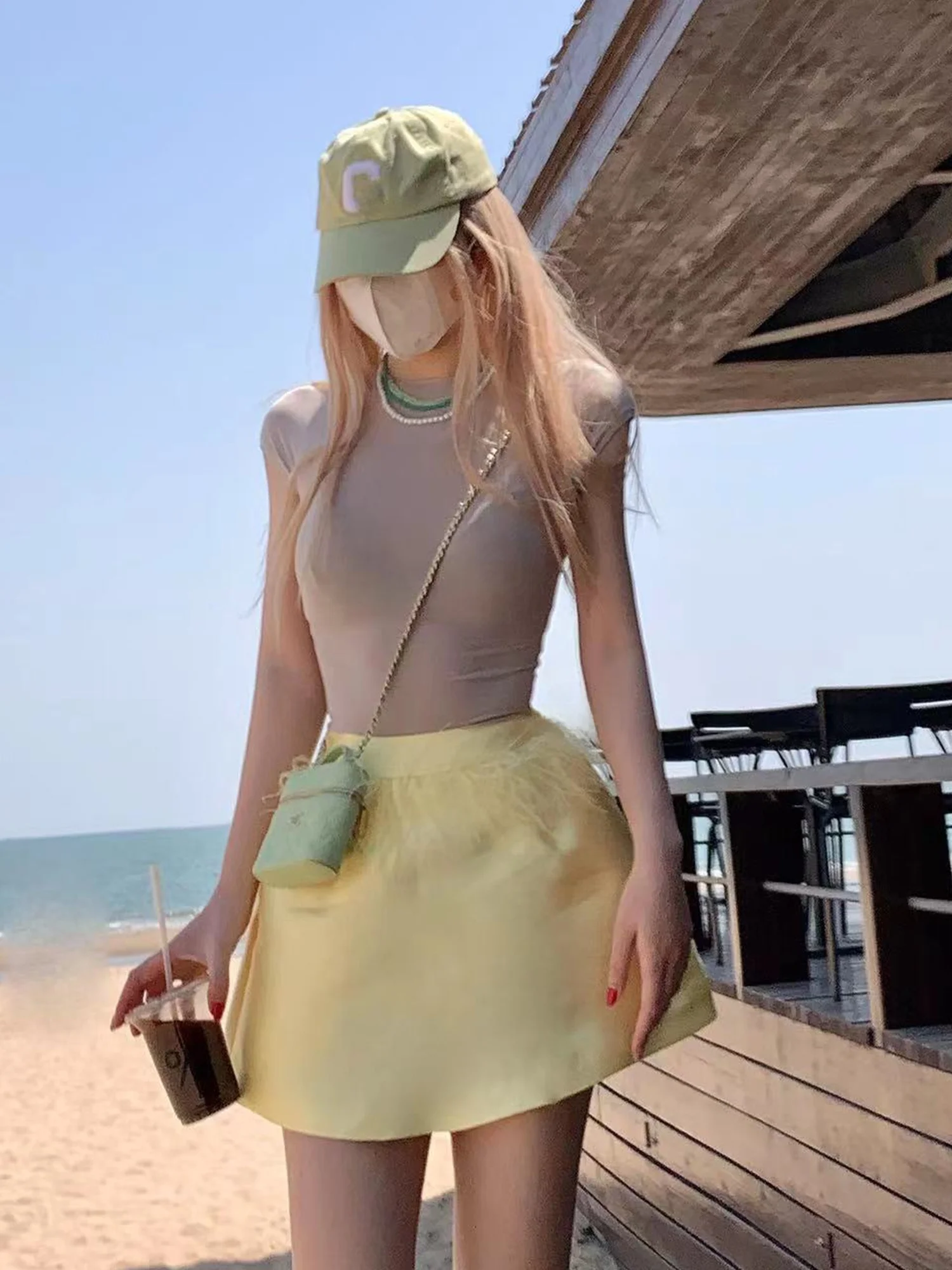 

Летняя атласная двухцветная юбка Amor с завышенной талией и перьями, белая, удлиненная, сексуальная, на молнии