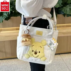 MINISO Disney Cartoon Winnie Bear Canvas Handheld Crossbody Bag Multi functional Fashion Women's Shoulder Bag