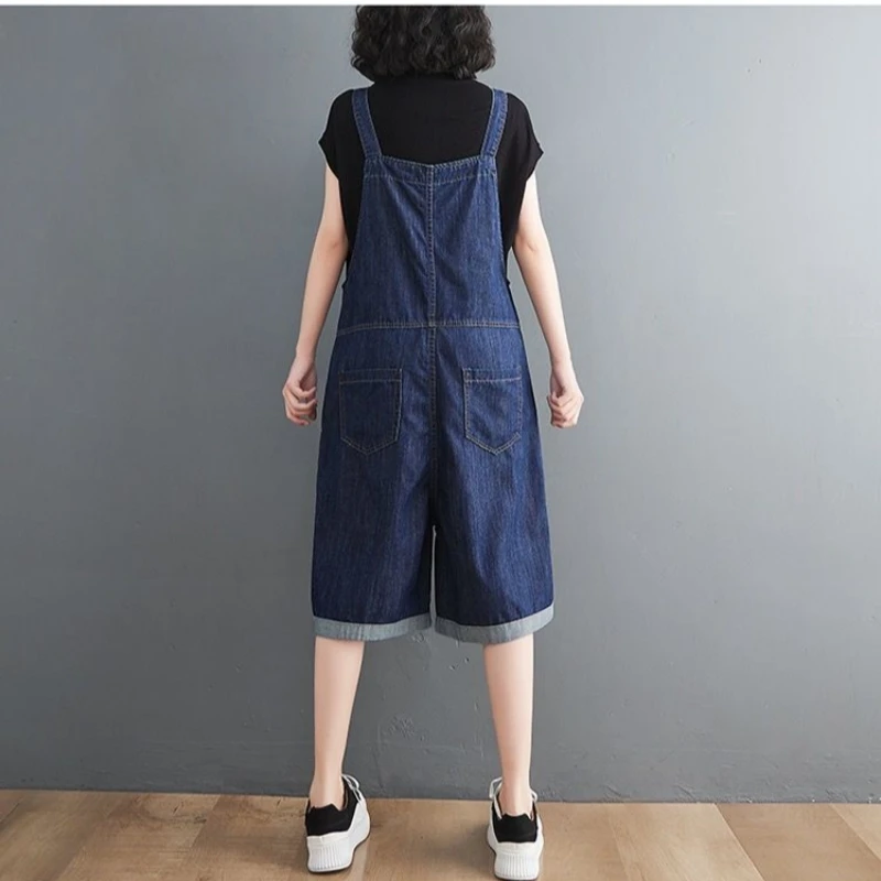 Celana pendek Denim musim panas, jumpsuit Romper kaki lebar kasual saku longgar wanita Korea, celana Suspender tanpa lengan