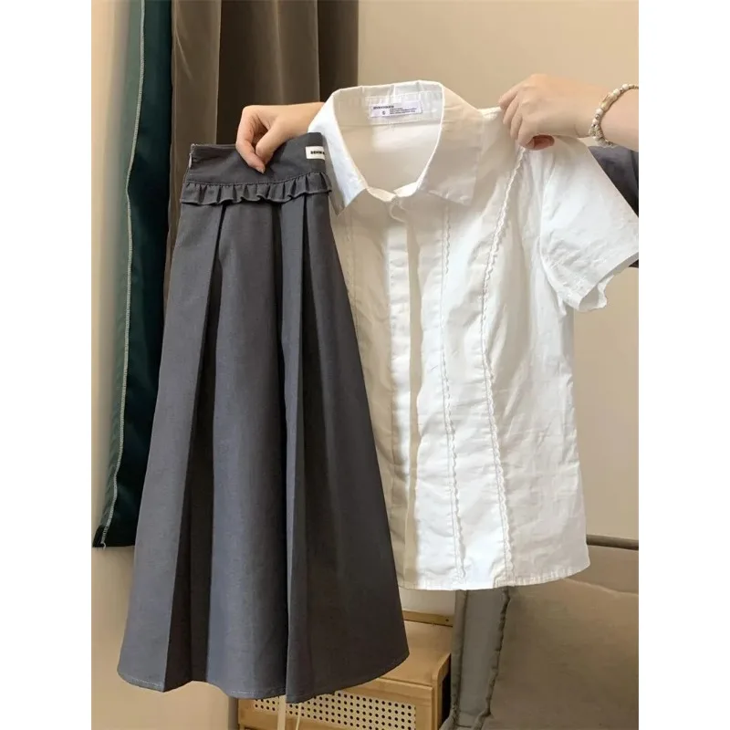 

Новые женские модные рубашки с коротким рукавом, сшитые на пуговицах, однотонные, универсальные, повседневные