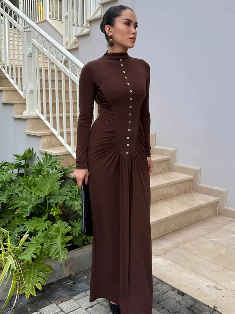 2025 Autunno Inverno Bottoni Tuniche increspate Abito lungo per le donne Elegante manica lunga Vita alta Pieghe Abiti da sera aderenti
