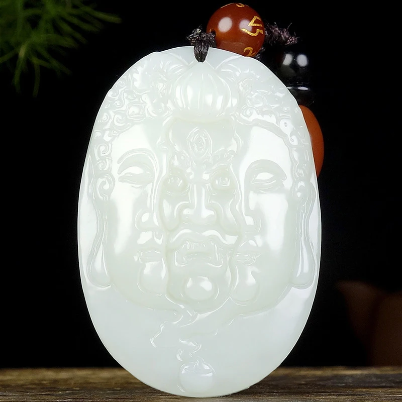 

Thought, One Moment Pendant, finely carved Hotan Jade Buddha and Demon paired together in a single tho
