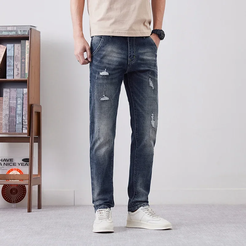 

Новые потертые эластичные джинсы, мужские рваные корейские модные тонкие повседневные эластичные винтажные джинсовые брюки с дырками на маленьких ножках