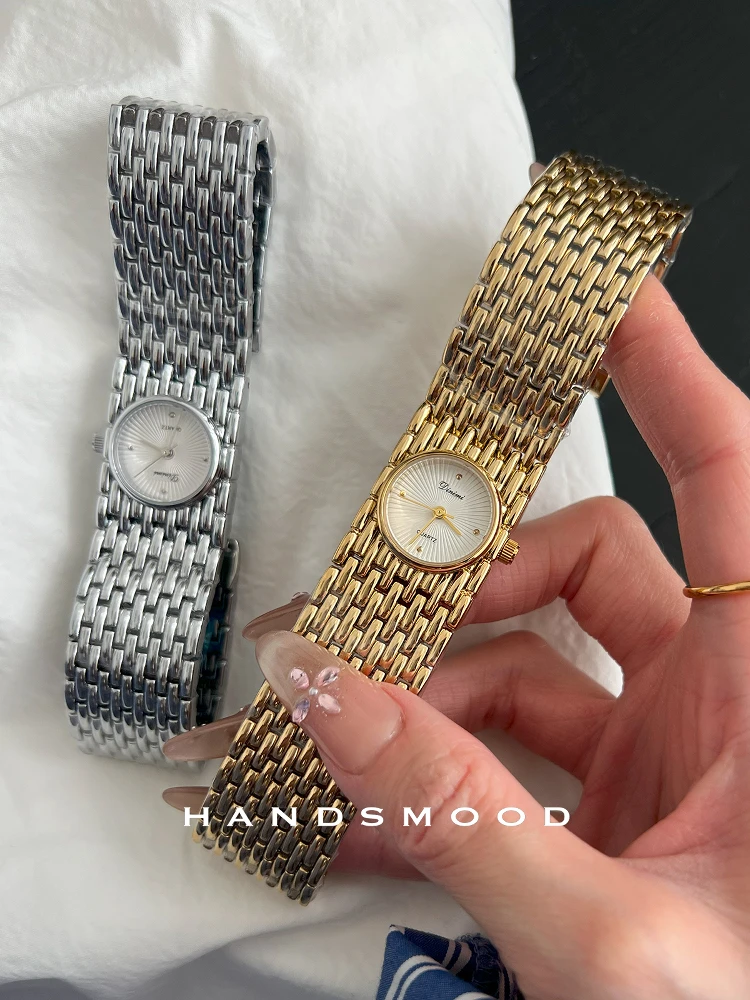 Elegant Women'S Watch, Stylish And Sophisticated, With A Wide Strap, A Gold Finish, Perfect For A Touch Of Understated Luxury.