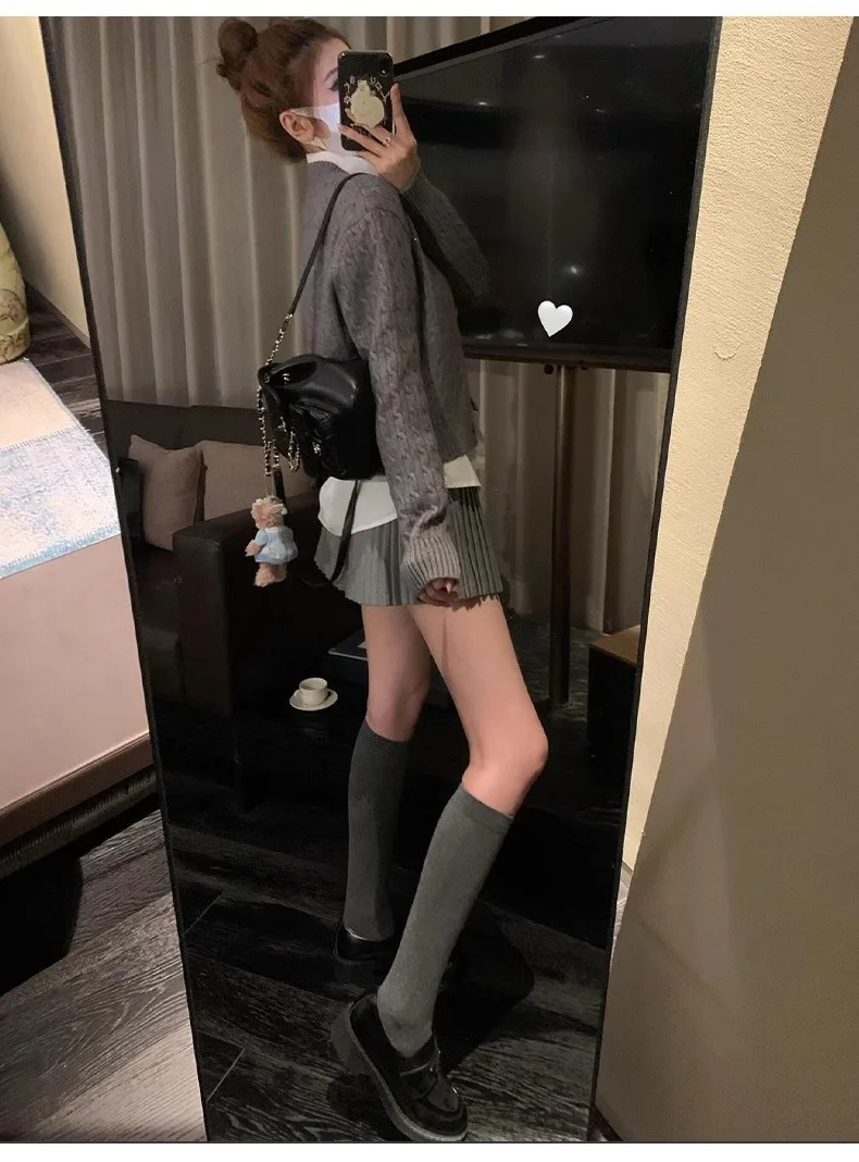 Saia plissada de órgão para mulheres na primavera e no outono 2025 nova saia curta casual pequena e fina de cintura alta